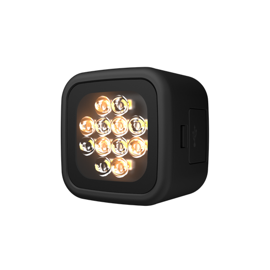 Compact LED smart video light with adjustable brightness and color temperature, portable and lightweight design.